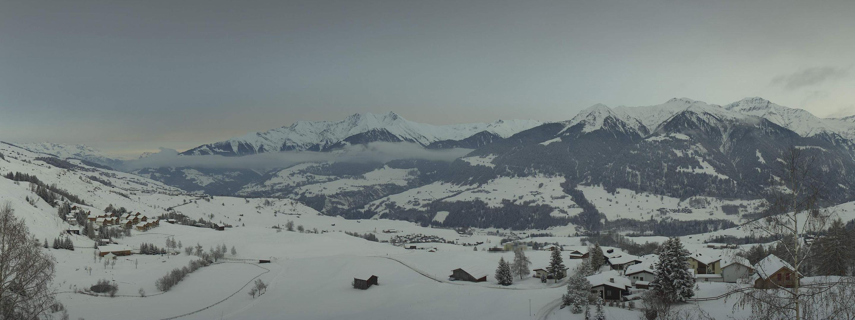 Webcambild vom Badesee Davos Munts bei Schneefall